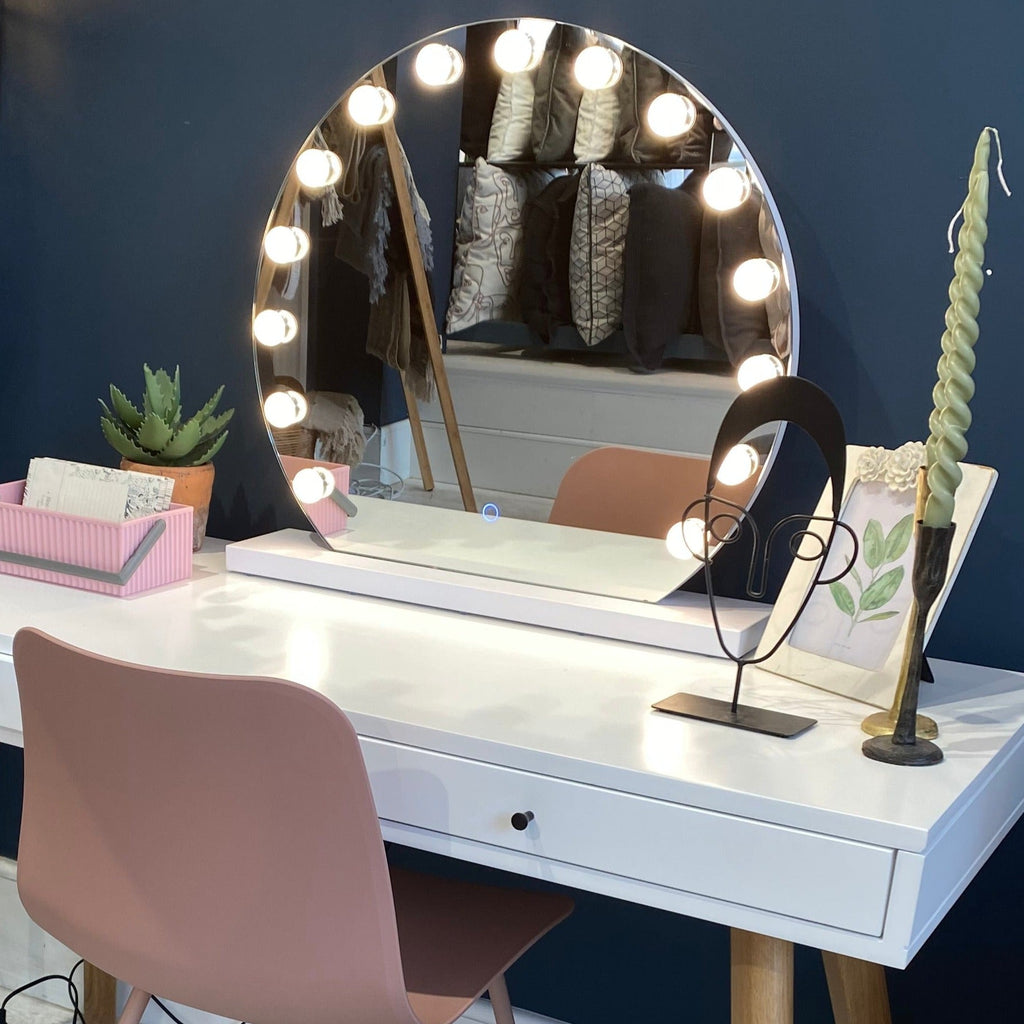 mirror with light-bulbs on table